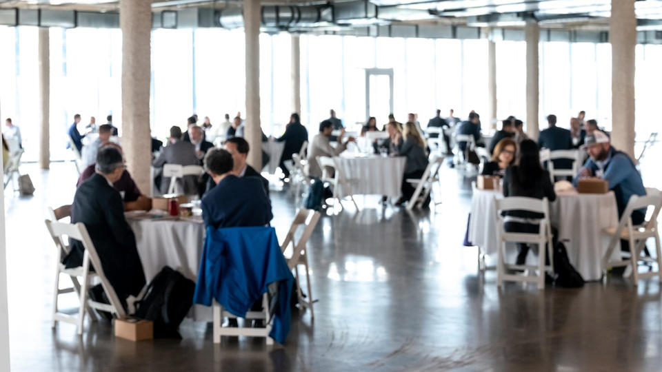 Room of people at tables